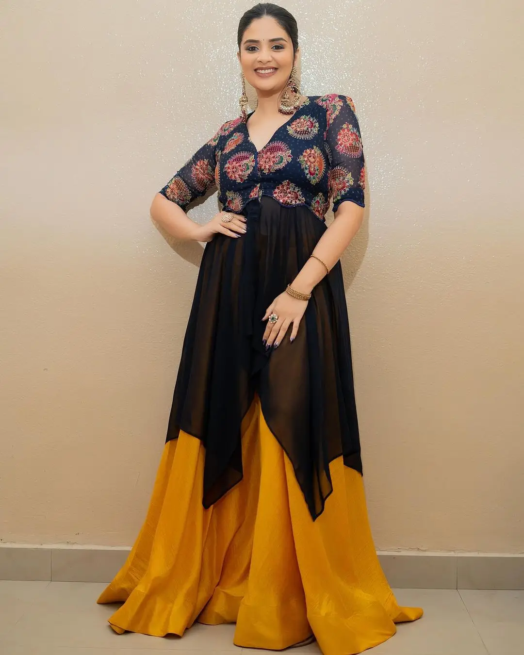 Maa TV Actress Sreemukhi in Orange Lehenga Black Choli